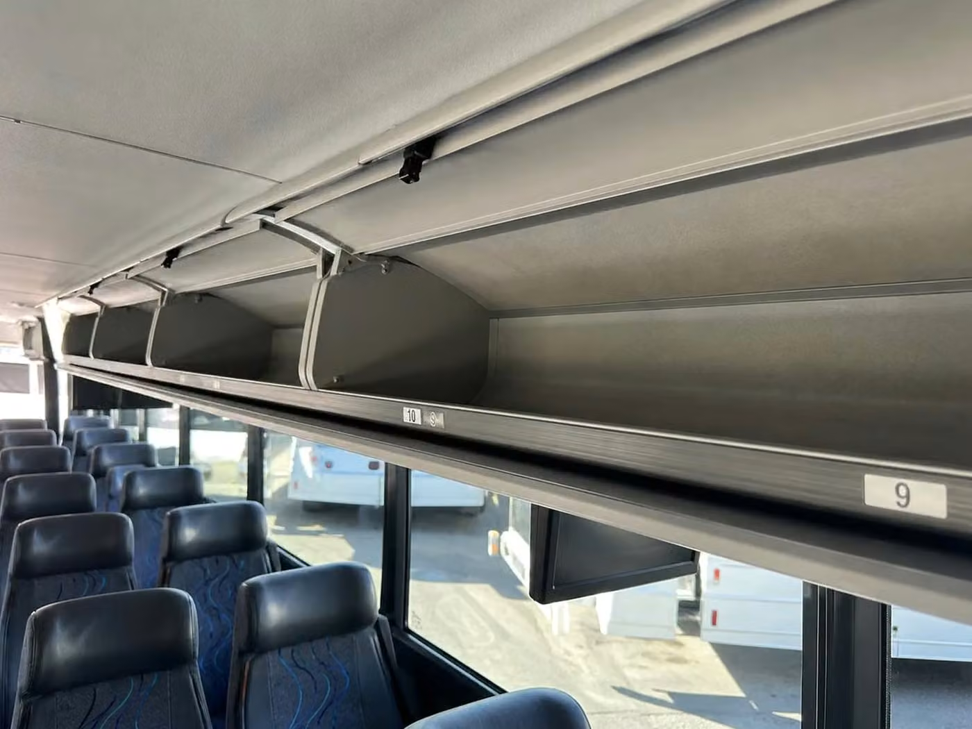 rexburg 56 passenger charter bus overhead storage