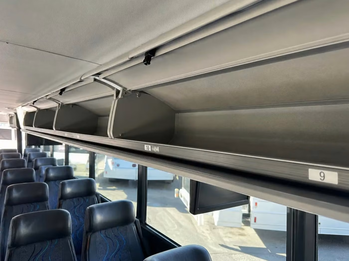 rexburg charter bus overhead storage